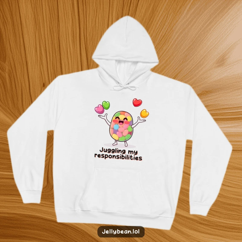 Funny Hoodie: A skilled anthropomorphic jelly bean character juggles smaller jelly beans. Ideal for fans of cute, funny, and impressive graphic hoodies.