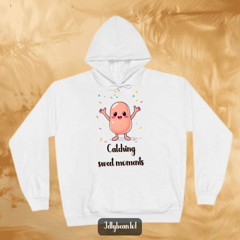 Funny hoodie showcasing a joyful anthropomorphic jelly bean enthusiastically catching falling sprinkles with open arms, a sweet and humorous design.