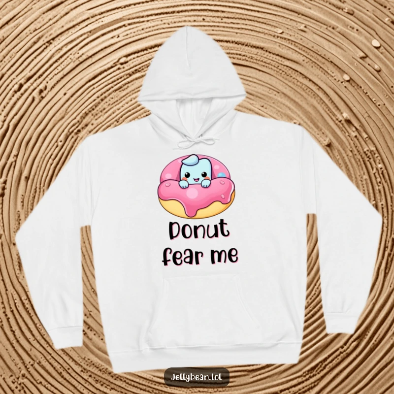 Funny hoodie featuring a cheeky jelly bean character peeking over a huge donut, offering warmth and a dose of playful mischief.