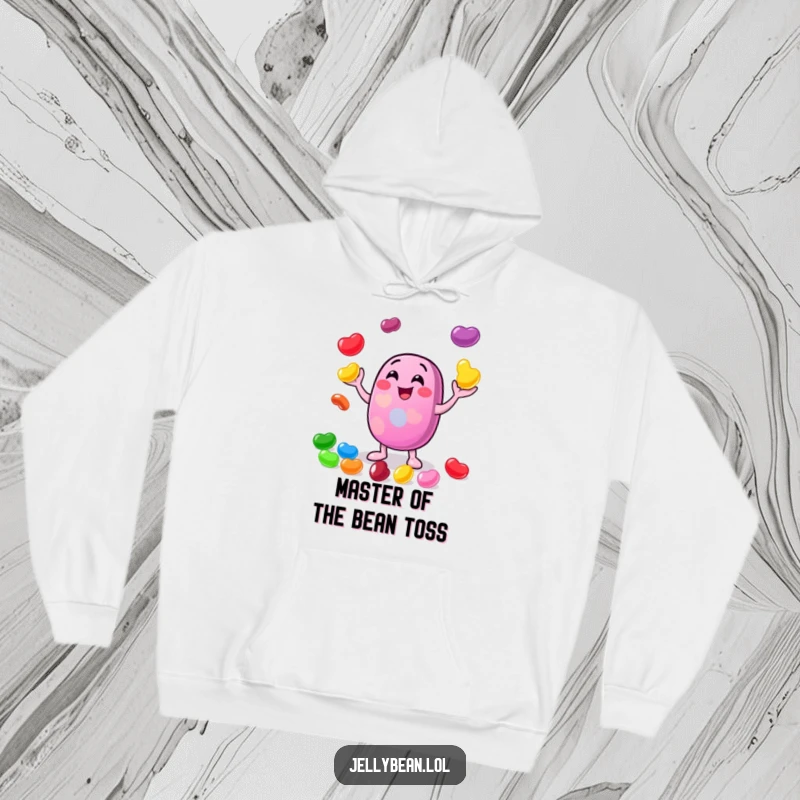 Funny hoodie depicting a cheerful jelly bean character skillfully juggling smaller, brightly colored jelly beans with contagious glee and a happy expression.