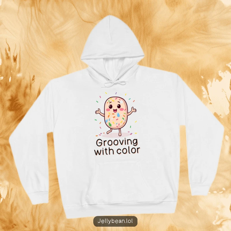 Funny Hoodie: A jelly bean character dances delightfully amidst rainbow sprinkles, offering warmth and a burst of playful, humorous energy.