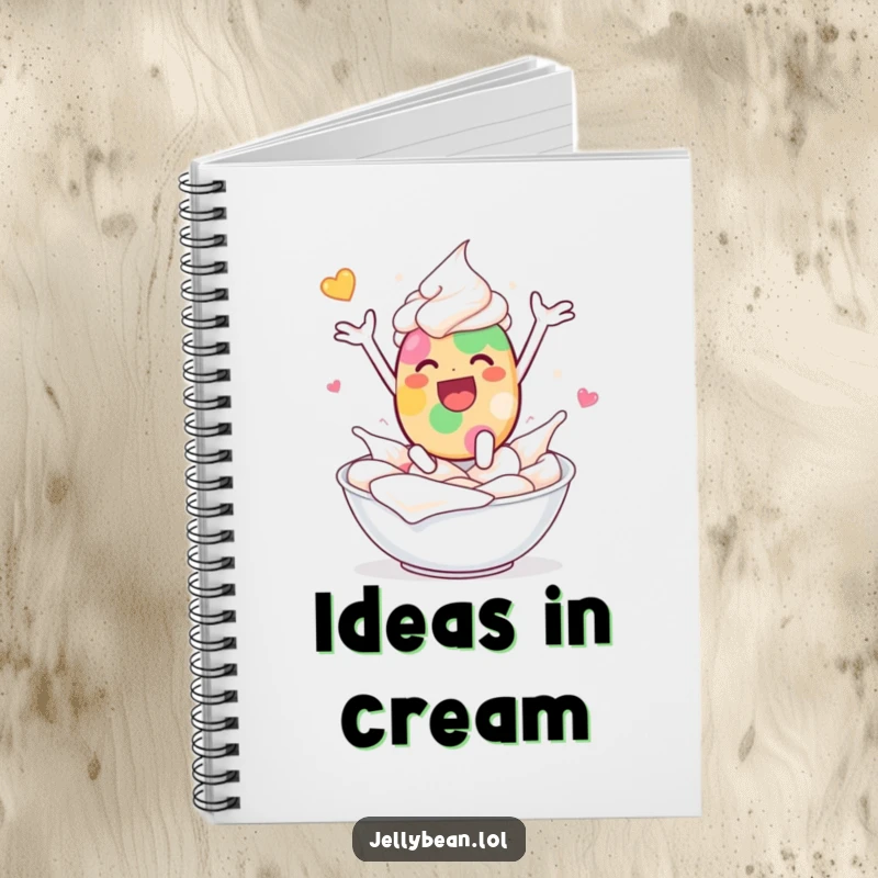 Funny notebook cover shows a jelly bean character joyfully leaping into whipped cream with delighted abandon, perfect for notes.